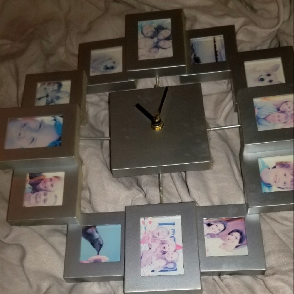 wall clock holds pictures
